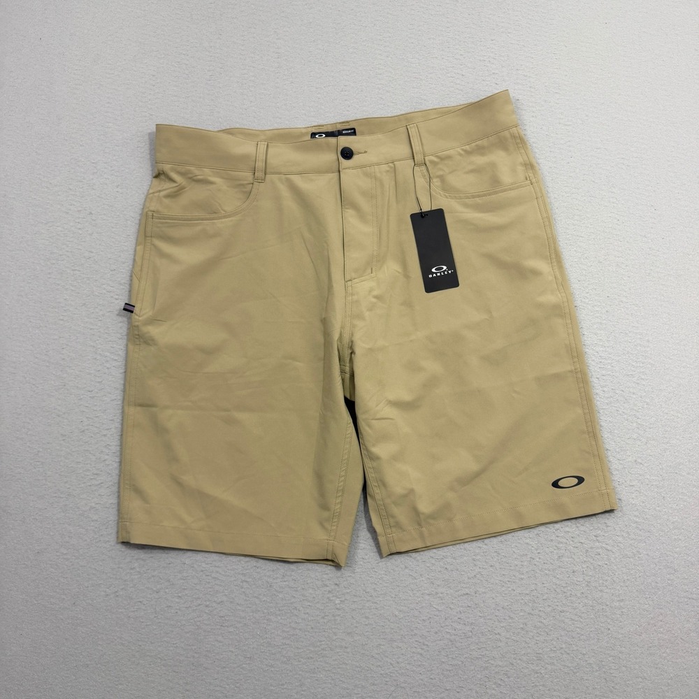 Oakley Shorts Mens 38 Tan Baseline Hybrid 21 2.0 Regular Fit FOA402208 NEW